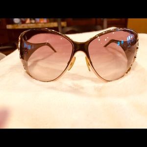 Roberto Cavalli Sunglasses. Oversized gold frames, brown lenses, light green arm